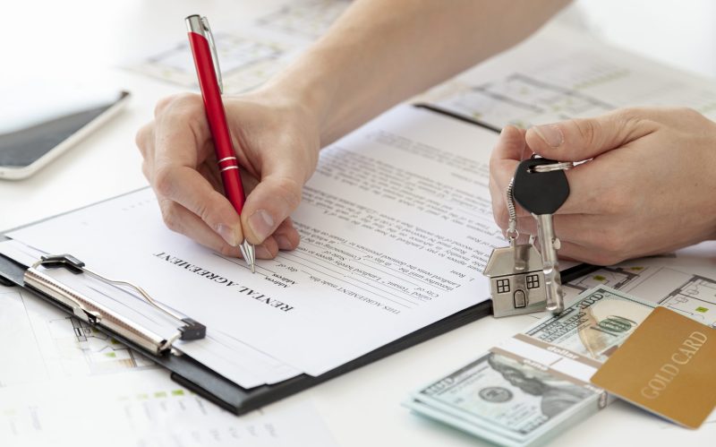 high-angle-man-signing-contract-new-home high-angle-man-signing-contract-new-home